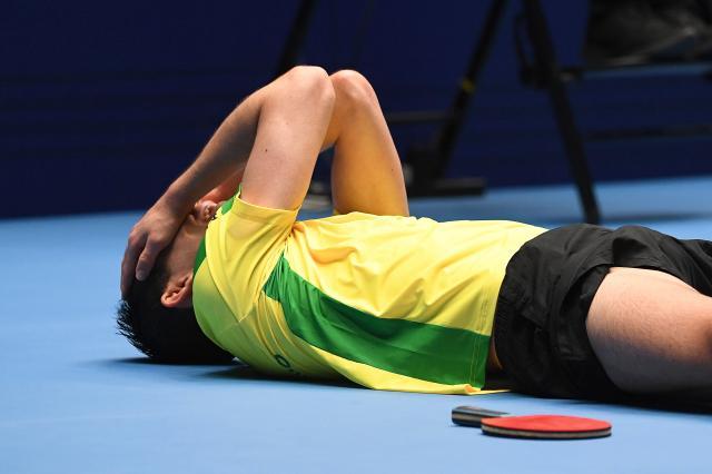 1745161871156031073.jpg (体育)(15)乒乓球——世界杯:雨果胜林诗栋夺得男单冠军XxjpseC007341_20250420_PEPFN0A001.jpg